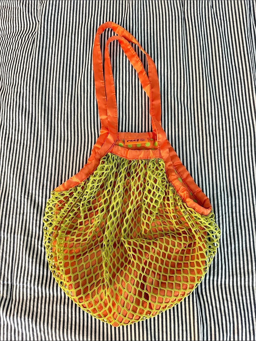 REEF - polka dot Green reversible Mesh Polka Dot Tote in Orange & Green